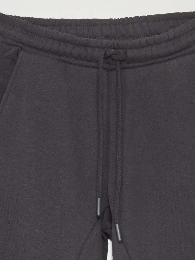 PANTALóN DE JOGGING DE TEJIDO DE CHáNDAL CON COSTURAS  NEGRO