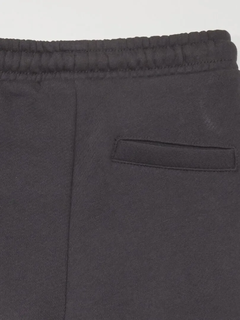 PANTALóN DE JOGGING DE TEJIDO DE CHáNDAL CON COSTURAS  NEGRO
