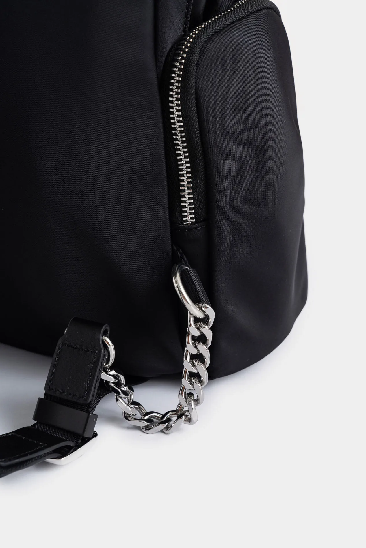 Tula morral Orión de lona y cuero para mujer detalle trenzado