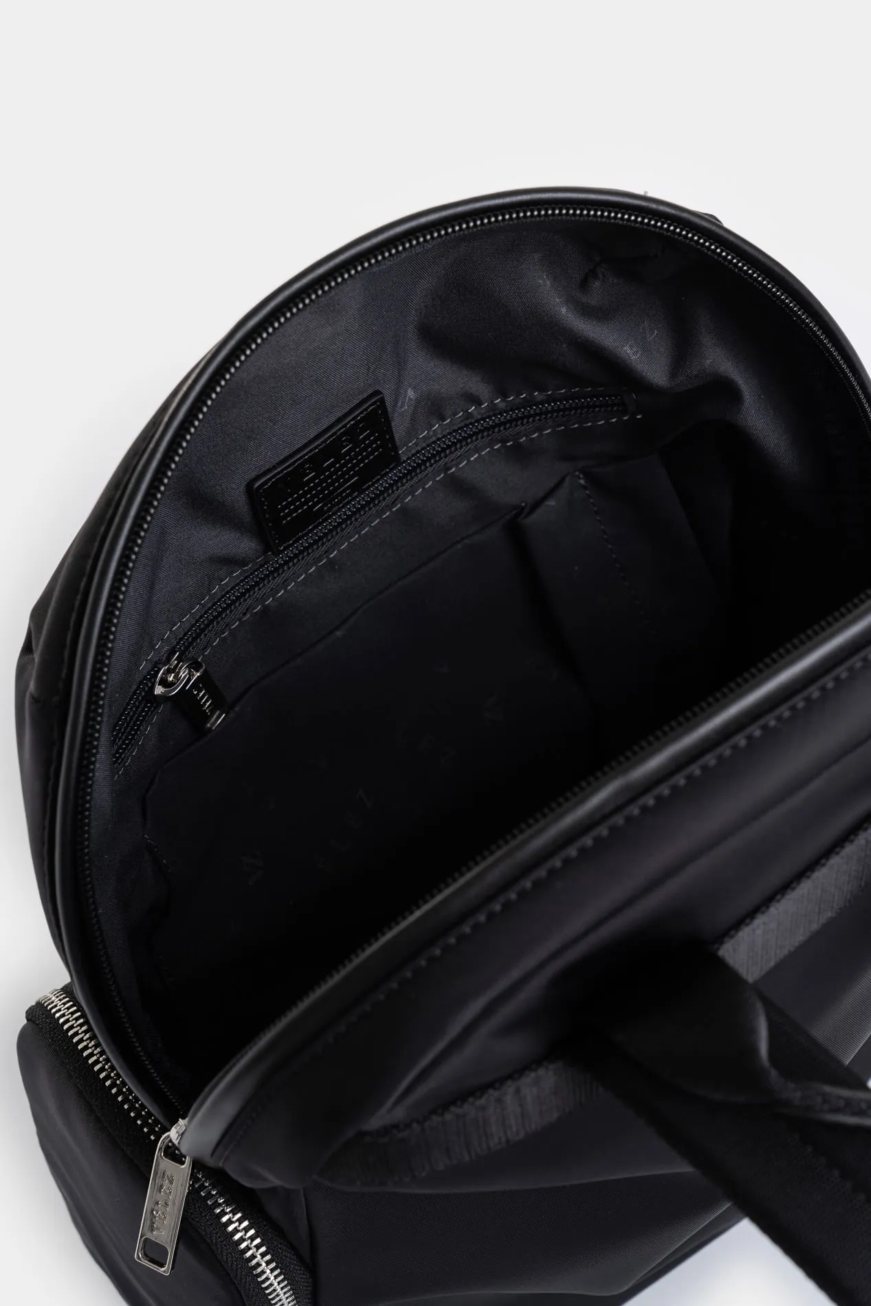 Tula morral Orión de lona y cuero para mujer detalle trenzado